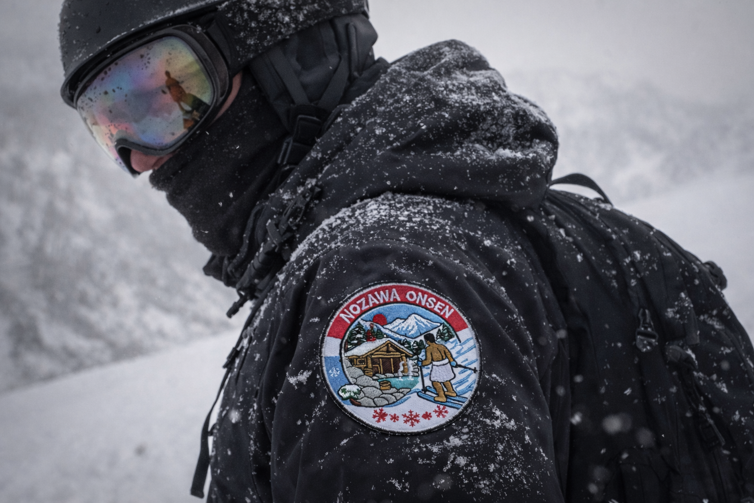 Snowboarder wearing Nozawa Onsen Ski Patch on their Shoulder